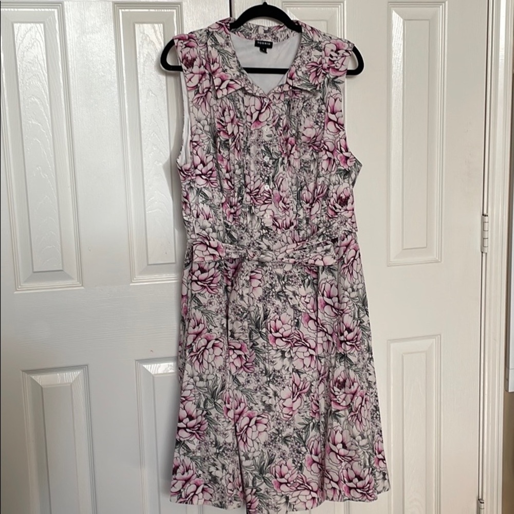 White swing dress with purple floral pattern